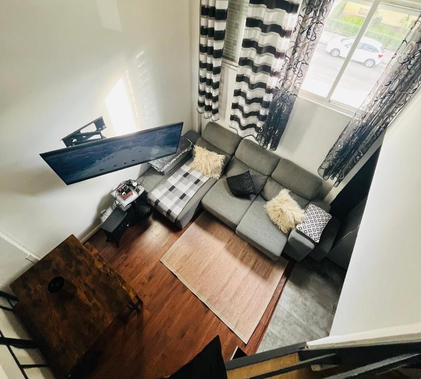 an overhead view of a living room with a couch at Madrid Loft duplex in Madrid