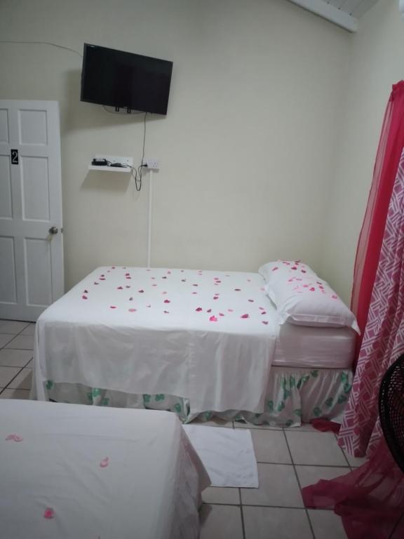 Letto o letti in una camera di Hilltop View Guesthouse