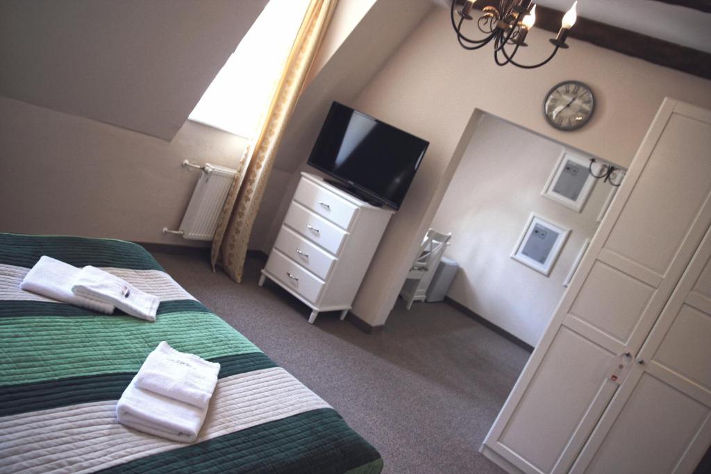 Postel nebo postele na pokoji v ubytování Hotel St.Michael