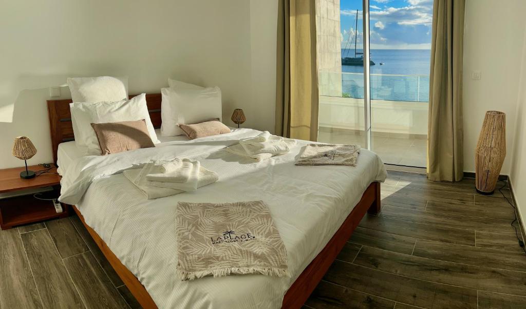 Postel nebo postele na pokoji v ubytování LA PLAGE MARTINIQUE