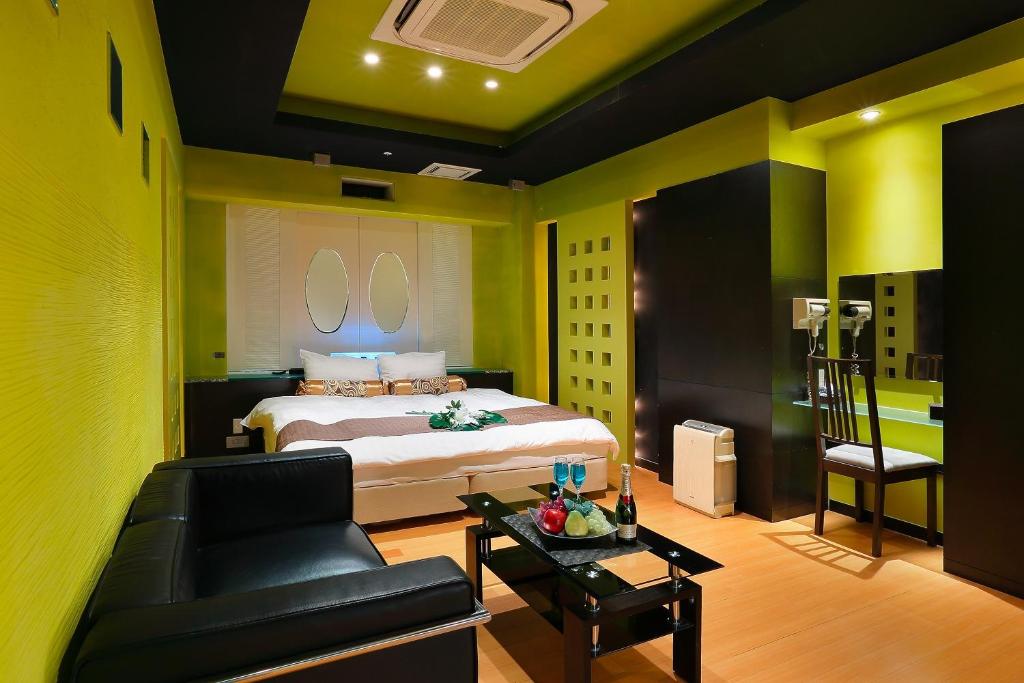 Ein Bett oder Betten in einem Zimmer der Unterkunft Hotel AXIS -アクシス-