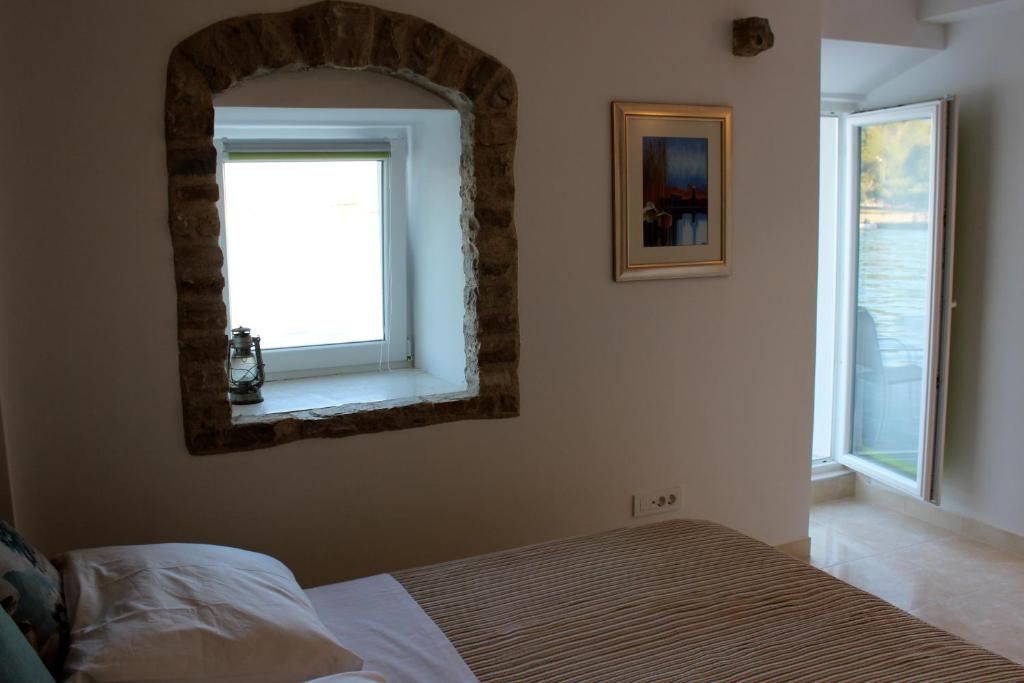 Posteľ alebo postele v izbe v ubytovaní Apartment La Luna