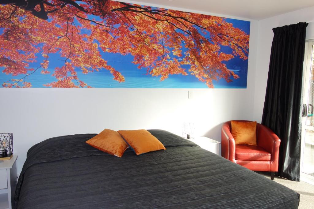 Postel nebo postele na pokoji v ubytování Northwood Motor Lodge