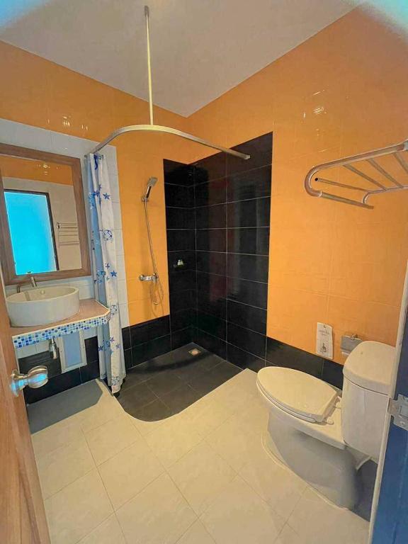 Koupelna v ubytování Jingjit Hotel