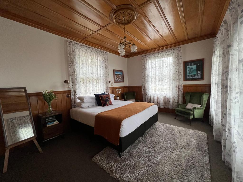 Postel nebo postele na pokoji v ubytování Riverhead Villa
