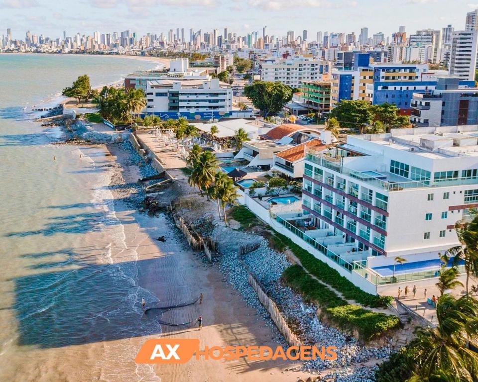 - Vistas aéreas a la playa y a la ciudad en AX Flamboyant Flat Bessa, en João Pessoa
