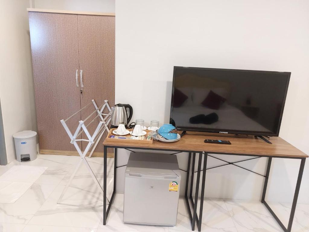 TV a/nebo společenská místnost v ubytování PR ROOM FOR RENT