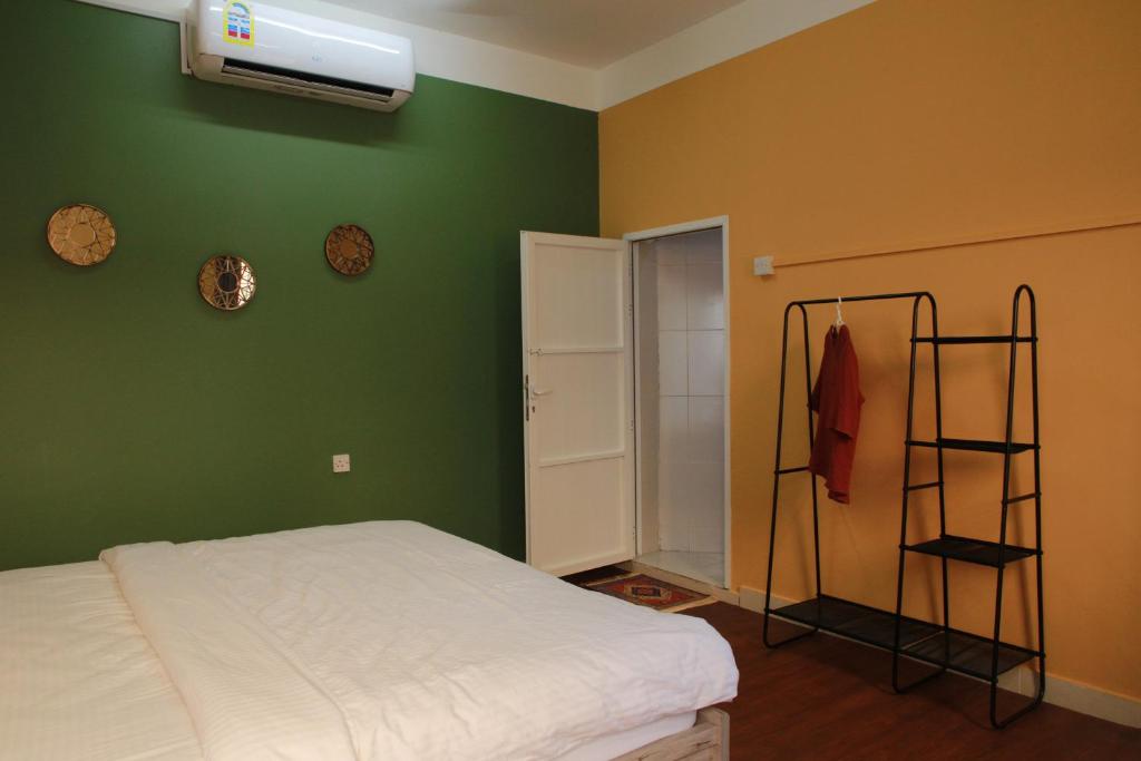 Postel nebo postele na pokoji v ubytování Nima guest house
