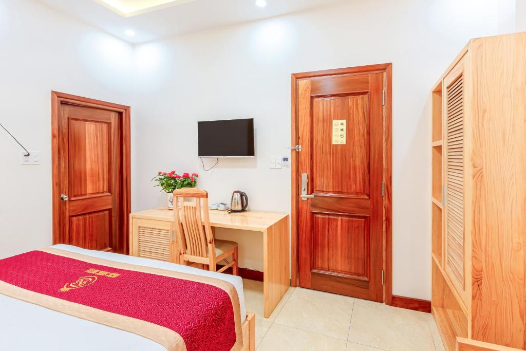 TV a/nebo společenská místnost v ubytování Ngọc Sang 1 Hotel