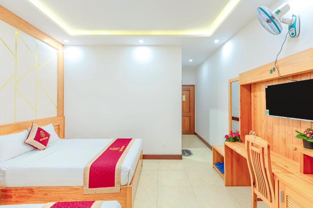 TV a/nebo společenská místnost v ubytování Ngọc Sang 1 Hotel