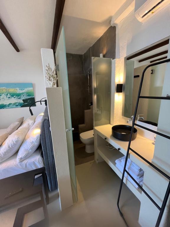 Postel nebo postele na pokoji v ubytování Villa Sandra Maria