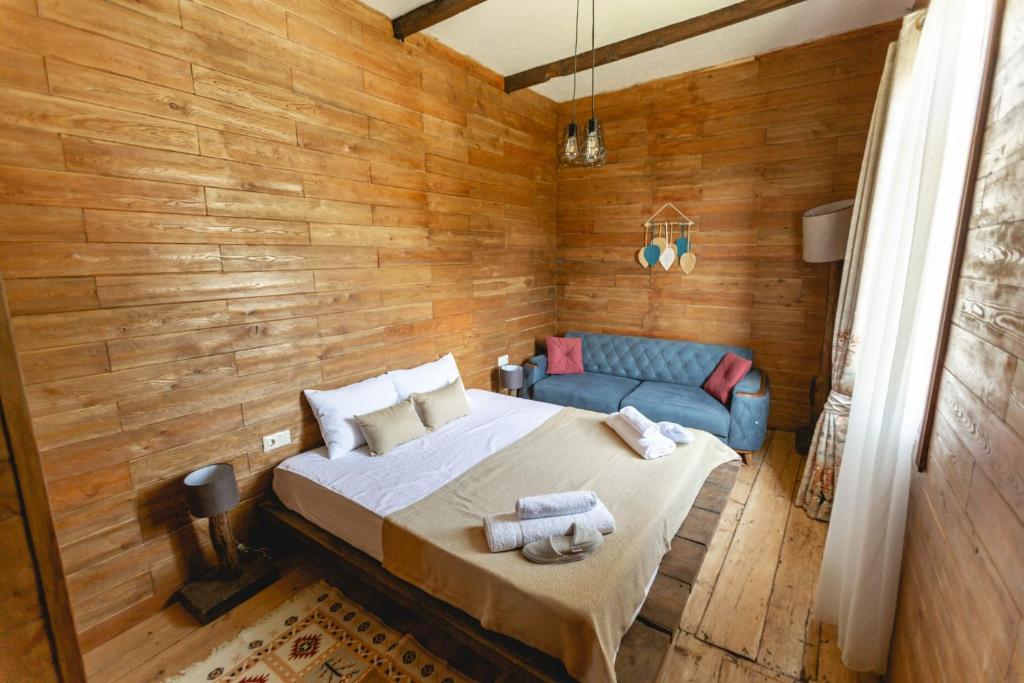 Postel nebo postele na pokoji v ubytování CHALET PANORAMA NIKORTSMINDA