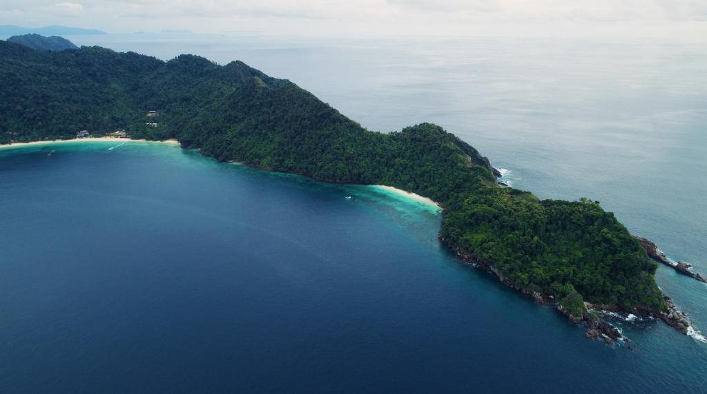 an island in the middle of a body of water at Victoria Cliff Resort Nyaung Oo Phee Island in Nga Khin Nyo Gyee Island