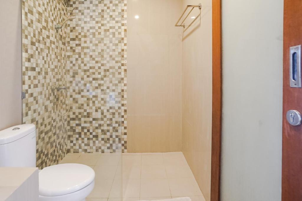 Koupelna v ubytování Mahesa Suites Seminyak