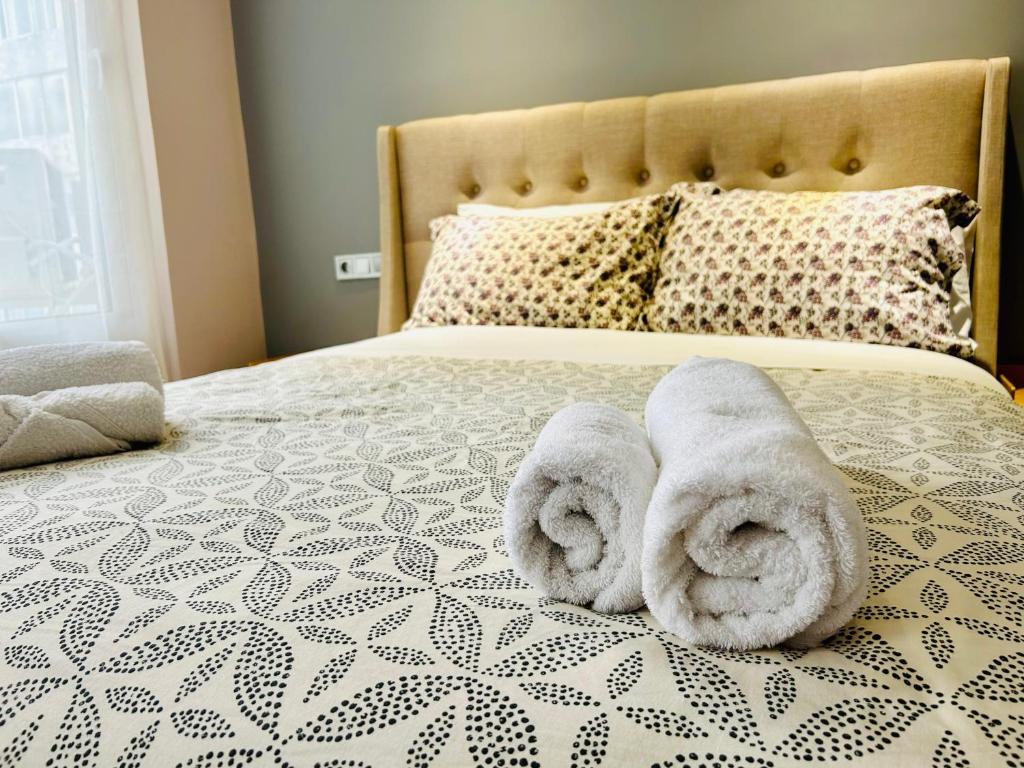 Postel nebo postele na pokoji v ubytování PORT TWINS SUITES No1