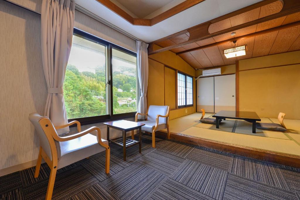 Postel nebo postele na pokoji v ubytování Ooedo Onsen Monogatari Hotel Suiyotei