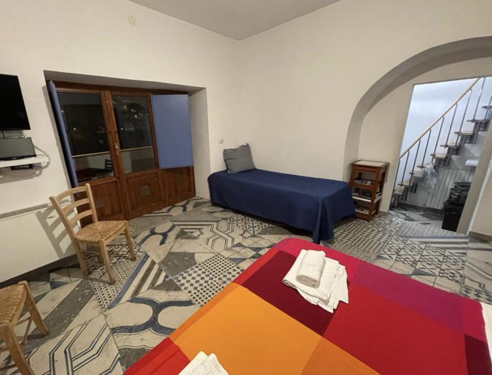 A bed or beds in a room at Casa dell'Avventura