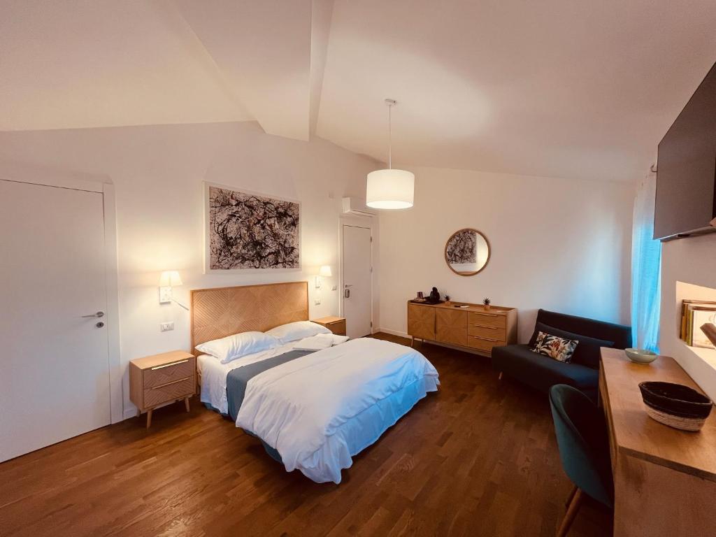 Postel nebo postele na pokoji v ubytování CIVICO 27 rooms