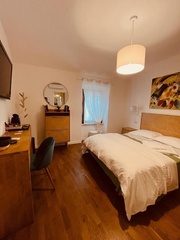 Postel nebo postele na pokoji v ubytování CIVICO 27 rooms