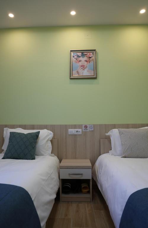 Postel nebo postele na pokoji v ubytování home in superior如家