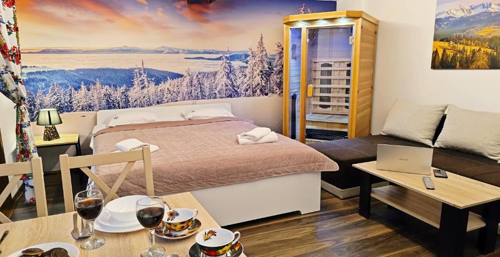 Posteľ alebo postele v izbe v ubytovaní Villa Vista Apartamenty & SAUNA