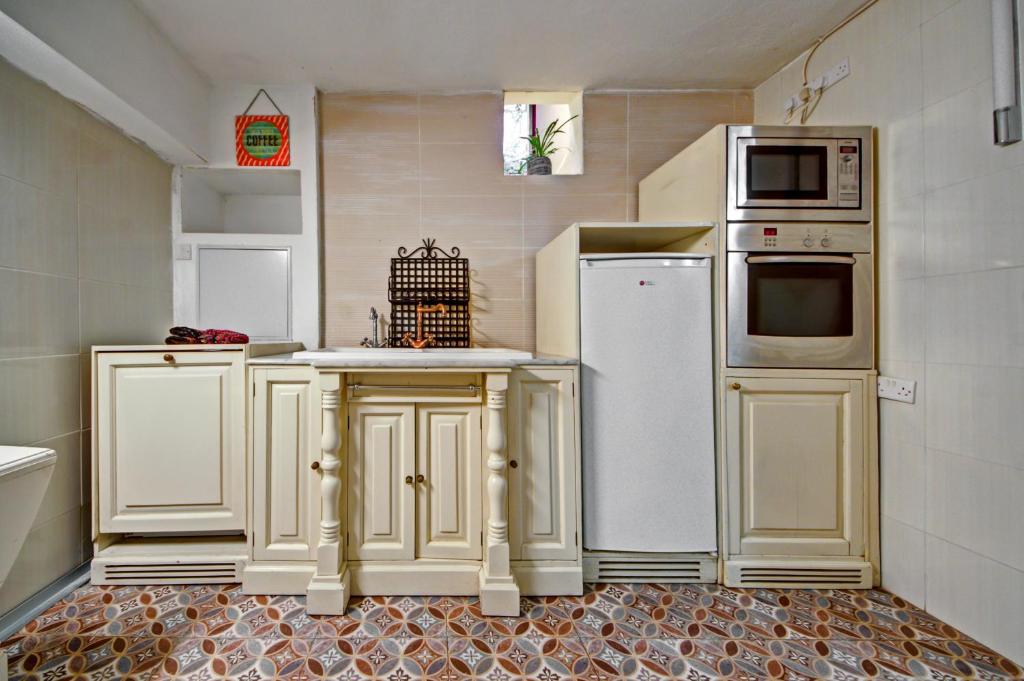 Kuchyň nebo kuchyňský kout v ubytování Boho Rooms Sliema