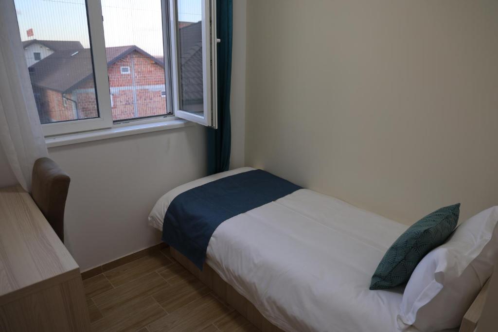 Postel nebo postele na pokoji v ubytování home in superior如家