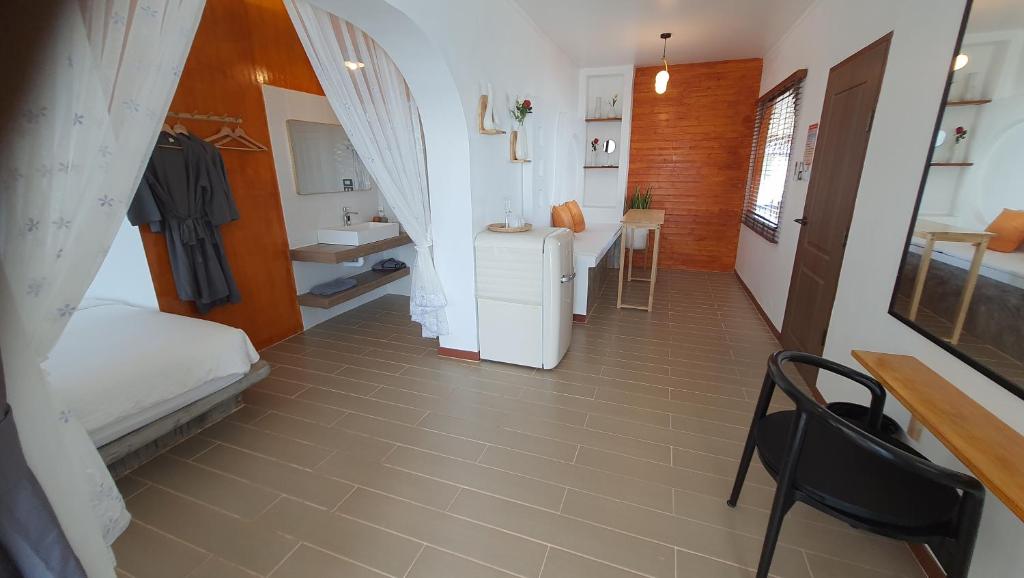 Postel nebo postele na pokoji v ubytování บ้านมัจฉา