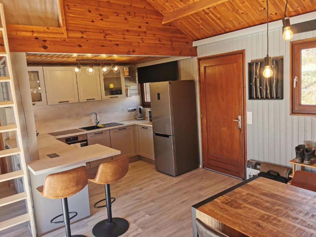 Kuchyň nebo kuchyňský kout v ubytování Chalet HEUREux