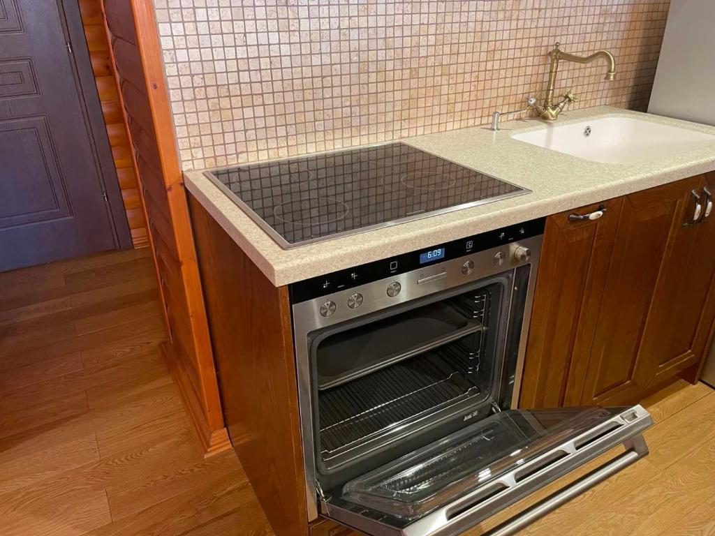 Kuchyň nebo kuchyňský kout v ubytování SOFIA APARTMENTS