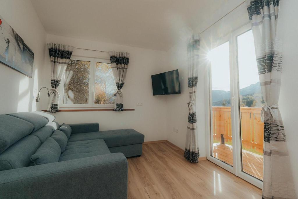 TV a/nebo společenská místnost v ubytování Bergblickapartments