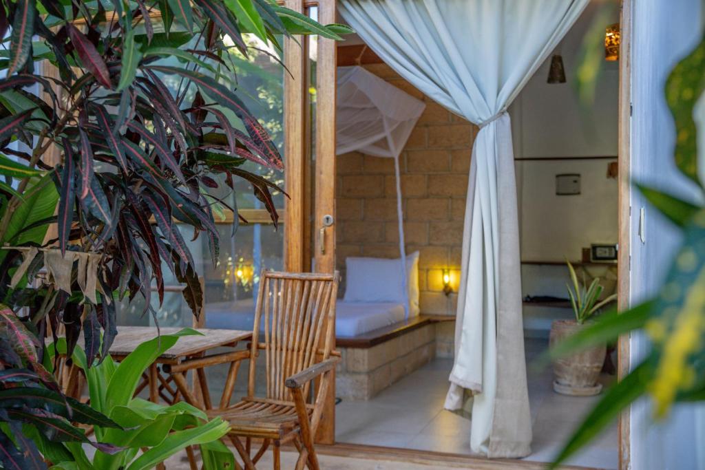 Ein Bett oder Betten in einem Zimmer der Unterkunft Maisha Nungwi - Boutique Hotel
