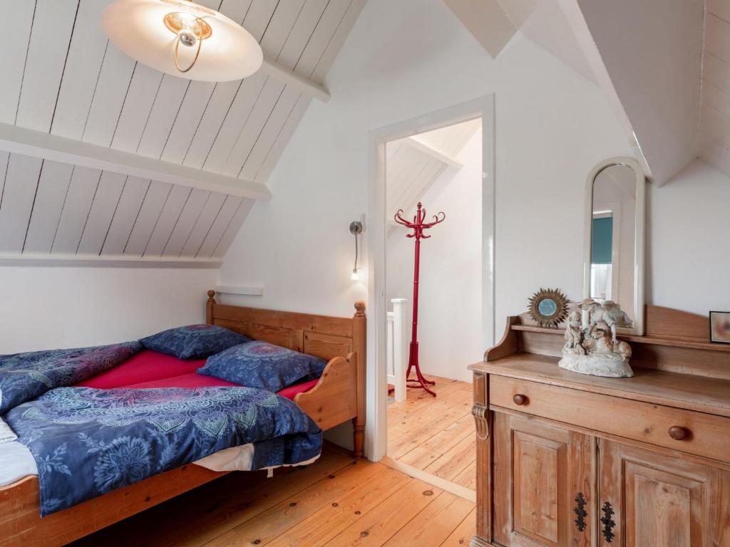 Postel nebo postele na pokoji v ubytování Holiday Home Dijkhuisje by Interhome