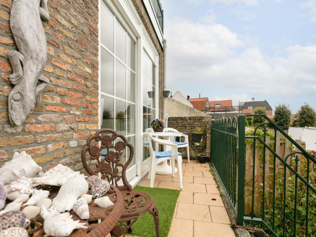 Balkón nebo terasa v ubytování Holiday Home Dijkhuisje by Interhome