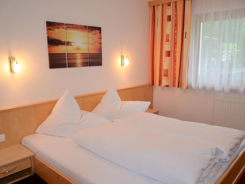 Posteľ alebo postele v izbe v ubytovaní Apartment Georg by Interhome