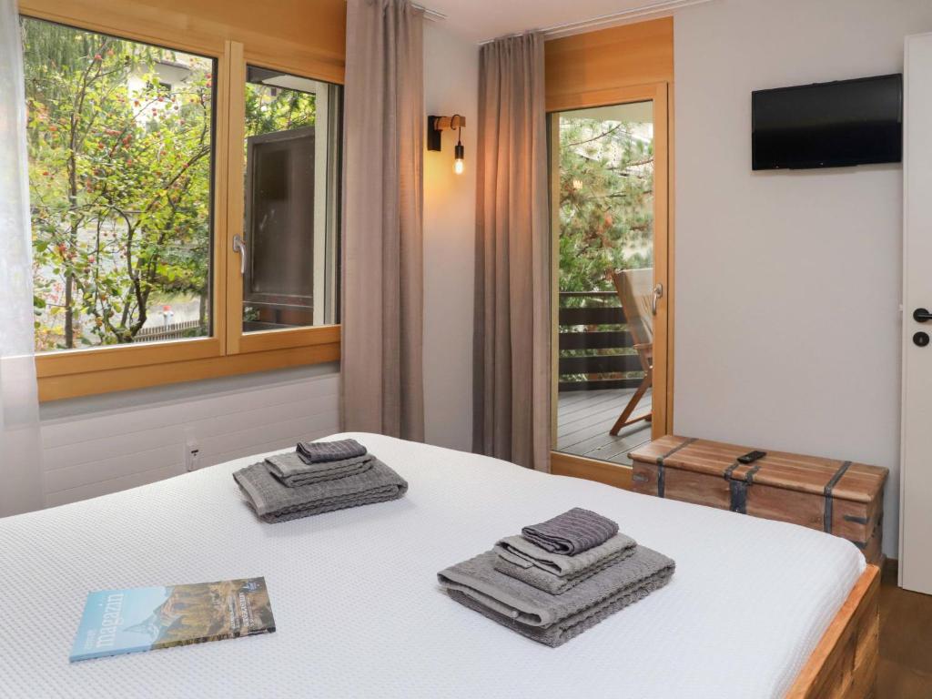 Postel nebo postele na pokoji v ubytování Apartment Papillon by Interhome