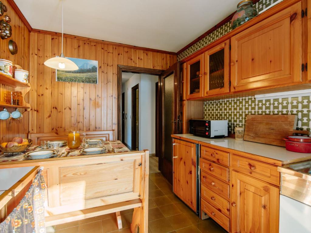 Kuchyňa alebo kuchynka v ubytovaní Apartment Condominio al Parco-9 by Interhome