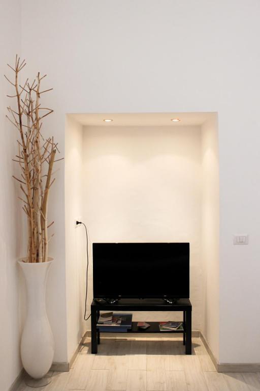 Telewizja i/lub zestaw kina domowego w obiekcie Salerno Center House - Corso Vittorio Emanuele