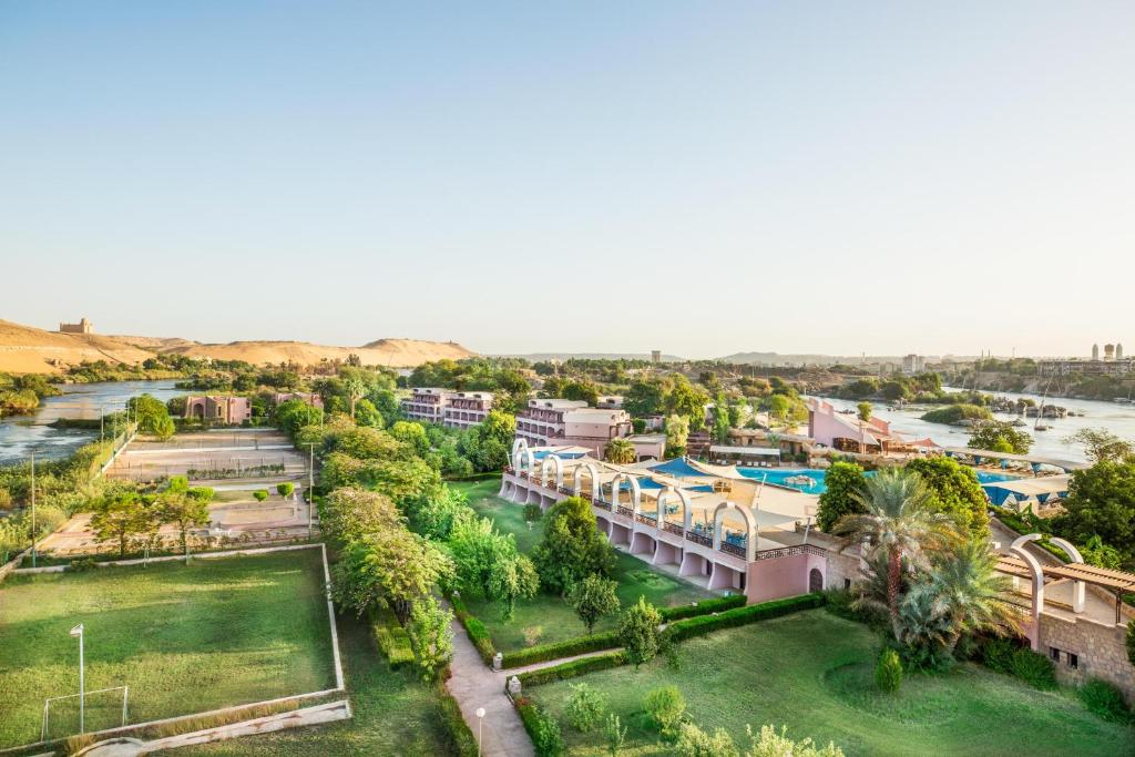 an aerial view of a resort with a river at Pyramisa Island Hotel Aswan in Aswan
