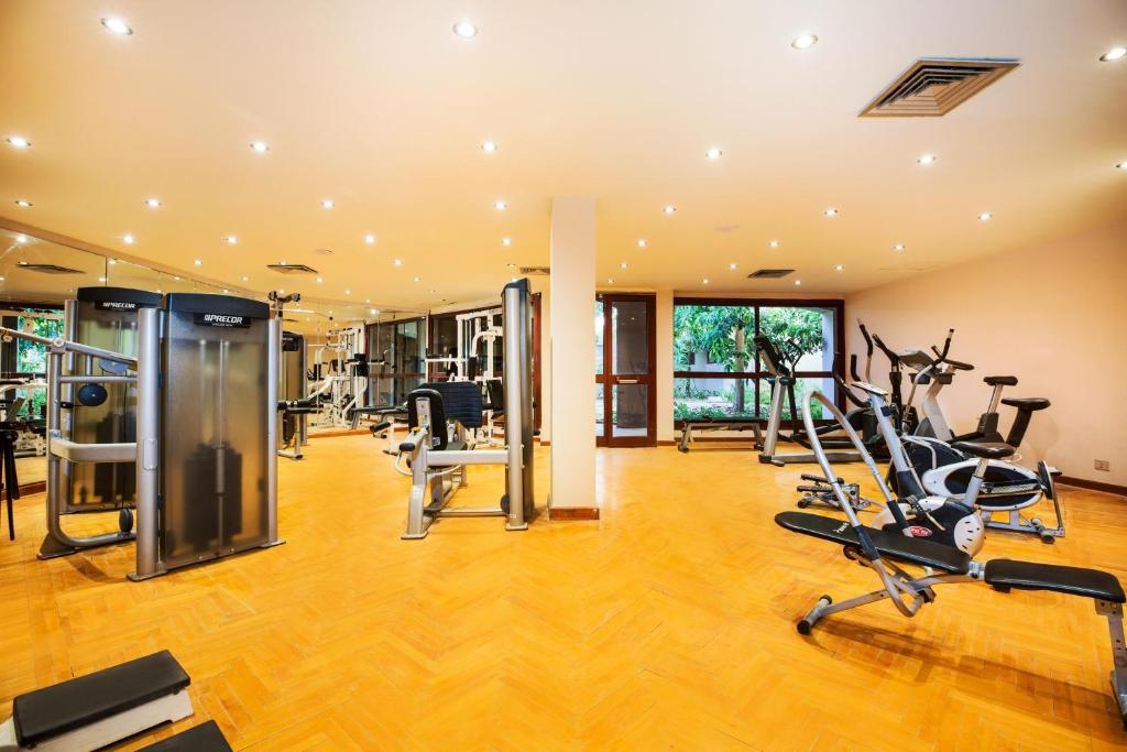 a gym with treadmills and elliptical machines at Pyramisa Island Hotel Aswan in Aswan