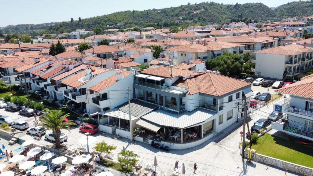 an aerial view of a town with buildings at Mougre studios in Polykhrono