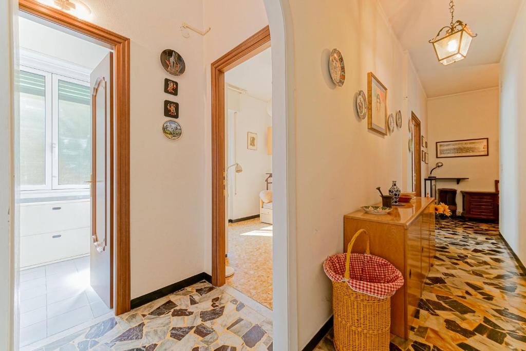 a hallway with a door leading to a bathroom at Apartment Vespucci by PortofinoVacanze in Rapallo