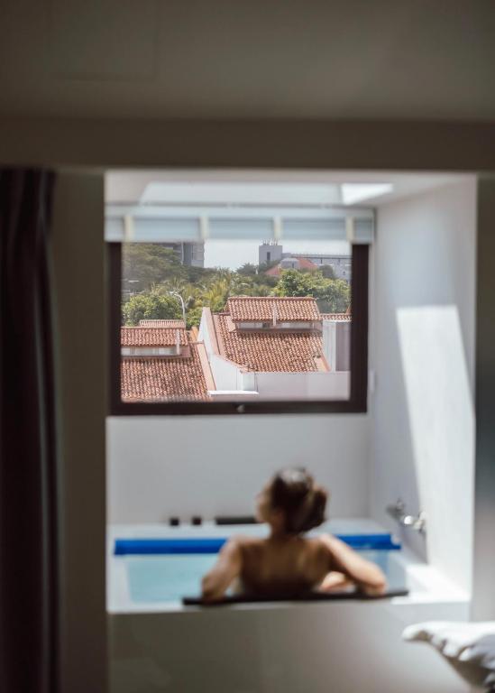 Balkón nebo terasa v ubytování Rest Bugis Hotel