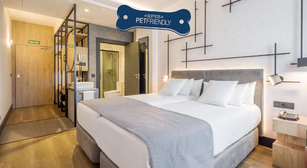Postel nebo postele na pokoji v ubytování Hotel Ilunion San Mamés