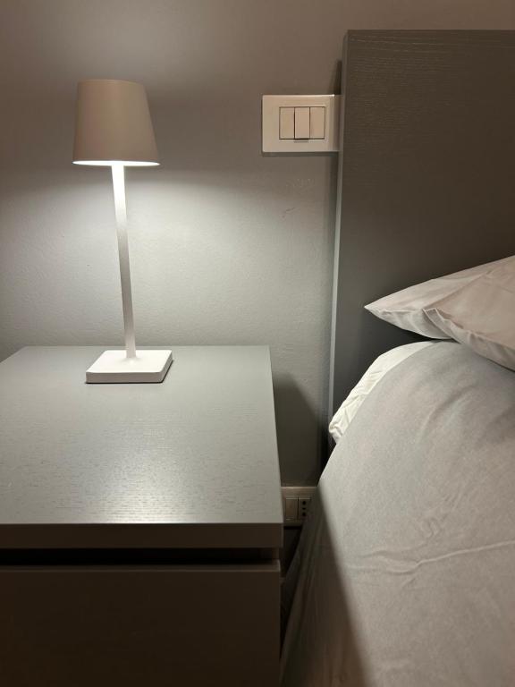 Кровать или кровати в номере Appartamento CoVa