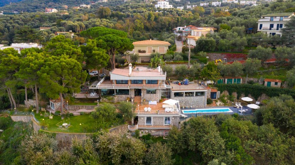 an aerial view of a large house in a town at Amore Rentals - Villa Giada in Sorrento