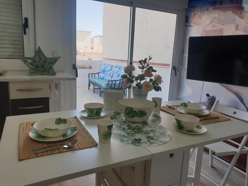 Telewizja i/lub zestaw kina domowego w obiekcie CALTERR - Loft con Terraza privada, Wifi, Recién reformado