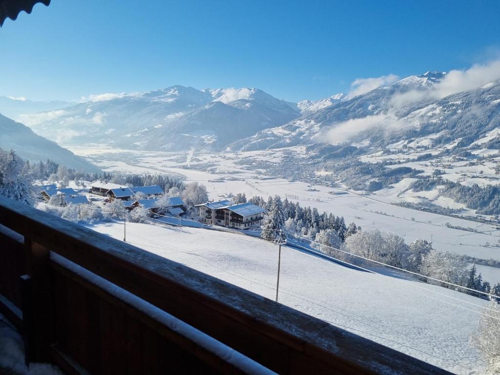 a view of a snow covered valley with mountains at Ferienwohnung La-Wurm mit privatem Whirlpool in Hart im Zillertal