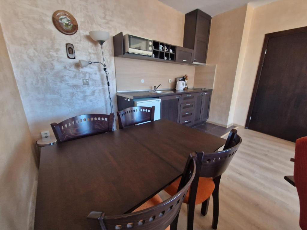 Kuchyň nebo kuchyňský kout v ubytování Bansko Royal Towers Thea Apartment