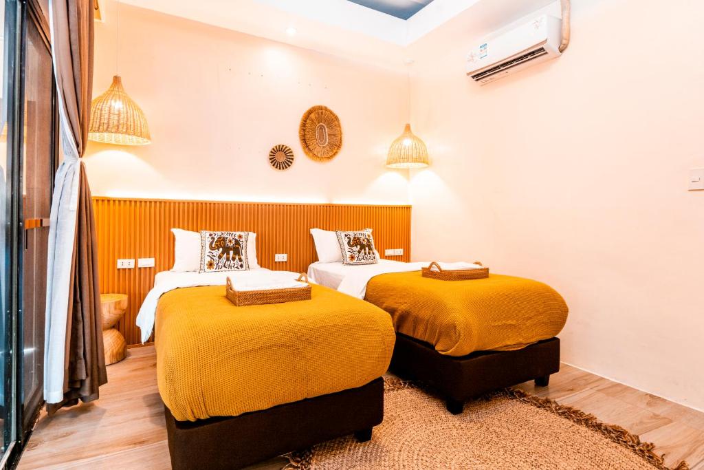 Postel nebo postele na pokoji v ubytování Molly Resorts